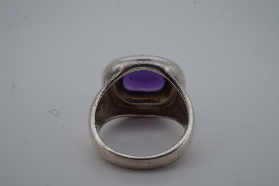 Paloma Picasso for Tiffany & Co., an amethyst ring, set with a sugarloaf cabochon amethyst, collet-set in bicoloured silver, size L, signed Tiffany & Co. and Paloma Picasso, British hallmarks for silver, pouch stamped Ti